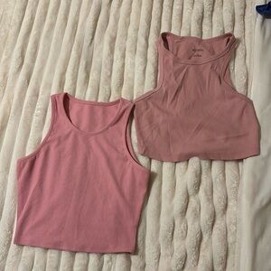Two pink sleeveless crop tops